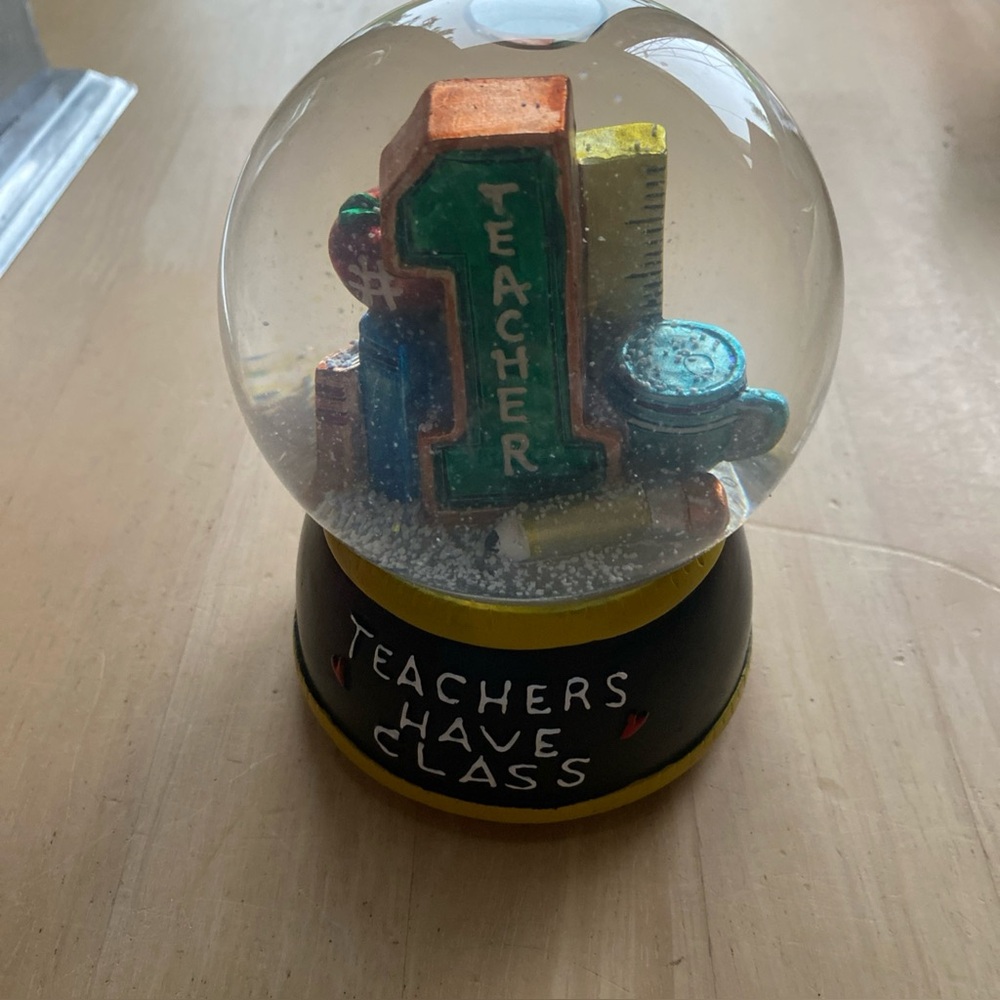Teachers have class water globe snow globe December home musical